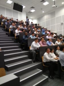 Attendees exploring digital technology exhibits at the 2018 Temasek Polytechnic and IMDA event.