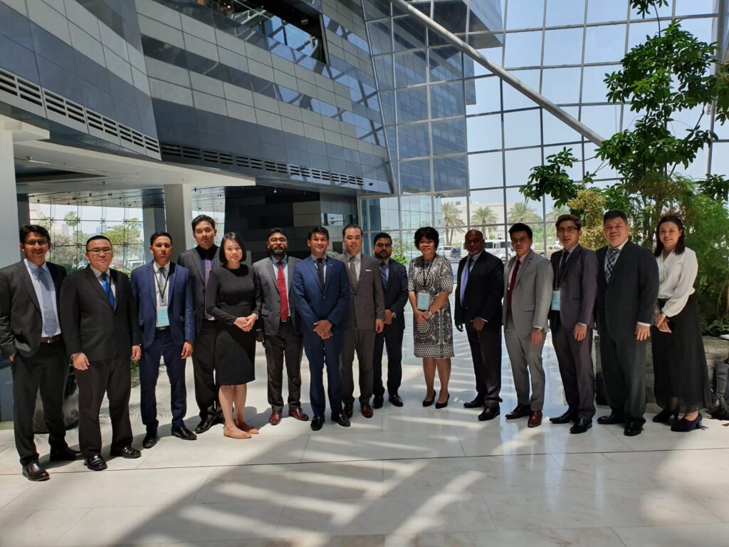 A group of SMEs in Singapore with Enterprise Singapore exploring Qatar's vibrant market, networking with local industry leaders, and experiencing the blend of traditional and modern culture.