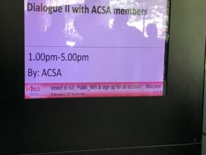 Members of the ACSA gather around a conference table, engaged in a deep discussion about industry challenges and innovations.