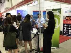 Photo collage from iFAME 2017, depicting speakers, attendees, and workshops focused on marketing and entrepreneurship.